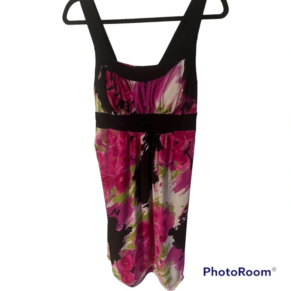 A cute dress that ties in the back by Bizz girl in a size small - Picture 1 of 7